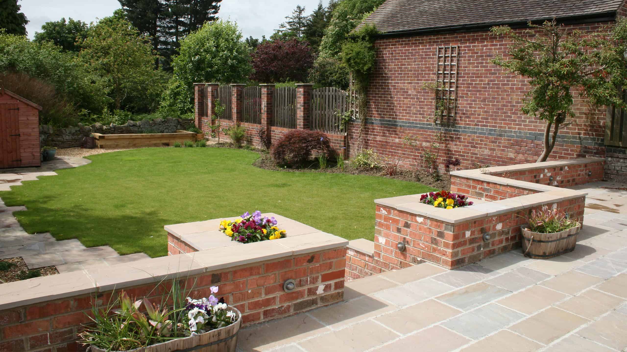 large-patio-with-brick-wall-and-garden-path-sheffield-2025-bg-size-2560